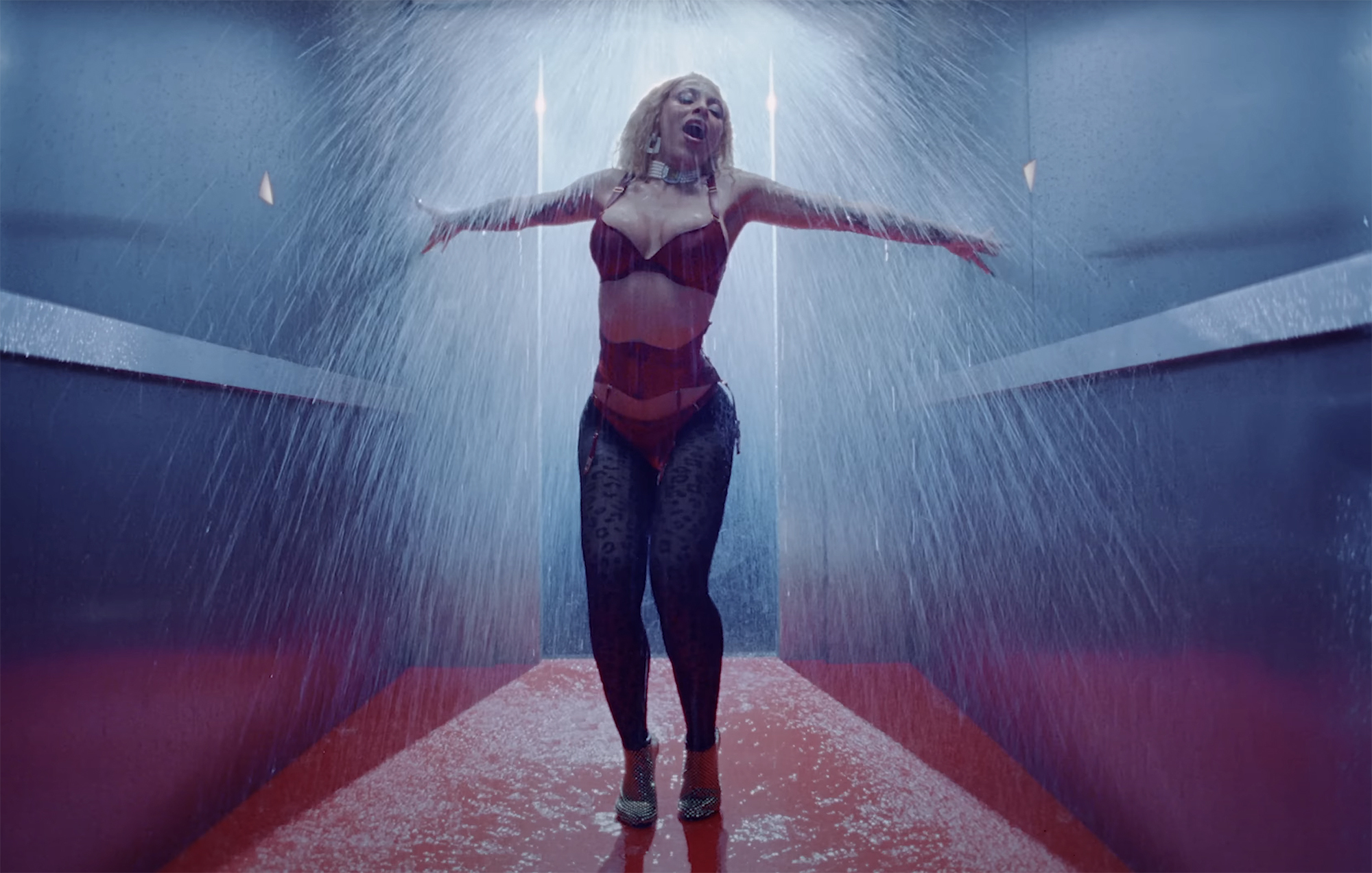 Doja Cat Flashes Skin in Red Lingerie and Plunging Top for New Music Video