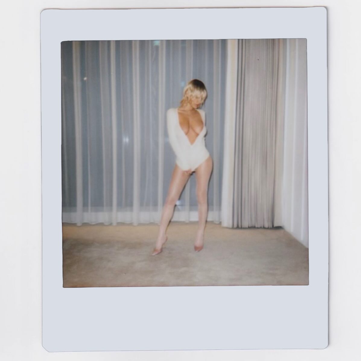 Bianca Censori takes the plunge in daring bodysuit as blond streak continues